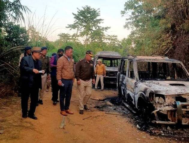 Charred remains of vehicles of security personnel after the vehicles were put on fire by some miscreants over the death of  people, who were allegedly killed by Armed Forces, in Mon district, Sunday, Dec. 5, 2021. A soldier succumbed to injuries in the violence Saturday night, and several others were severely injured, said the Army’s Dimapur-based 3rd Corps in a statement (PTI Photo)